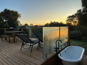 Enjoy a renovated retreat with outdoor bath